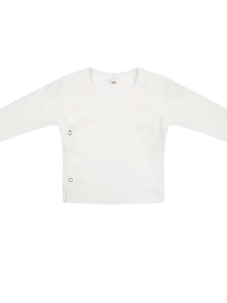Een overslag shirt met lange mouwen van Little Indians in de kleur wit, gemaakt van 100% biologisch katoen.